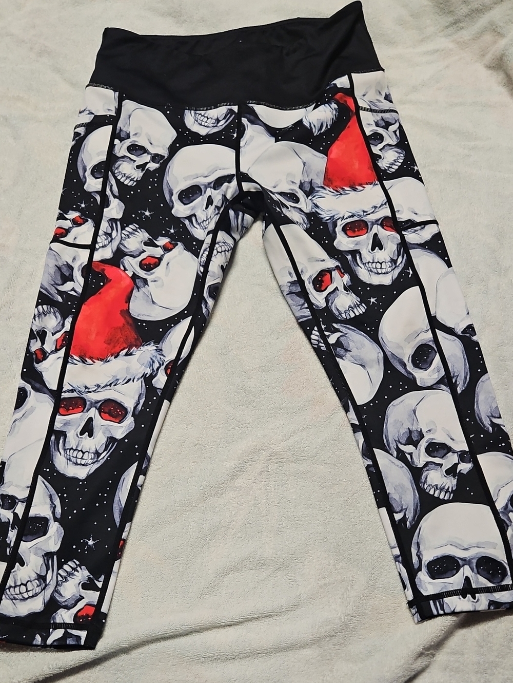 Constantly Varied Gear Black Skull Leggings with Red Santa Hats
